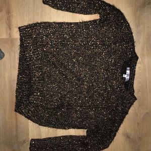 Jennifer Lopez sparkly long sleeved shirt